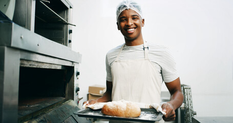 Bread, baker and portrait with black man and oven for cooking, culinary process and food production. Health, wheat and baking with person in coffee shop for catering, restaurant and bakery kitchen