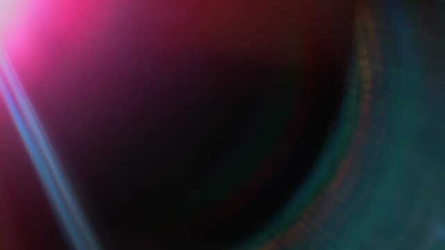 Dynamic abstract pink and blue light leaks with optical flare effect, glowing gradient colors, and cinematic lens flare transitions on a dark background for creative overlays
