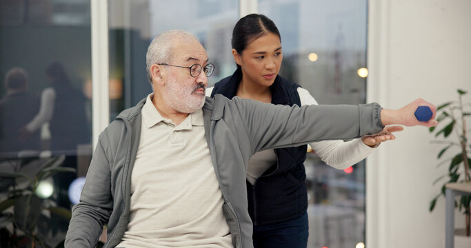 Dumbbell, physiotherapist and exercise with senior man in rehabilitation, help or muscle recovery. Physical therapy, woman and elderly patient weightlifting, fitness and health in medical clinic - Powered by Adobe