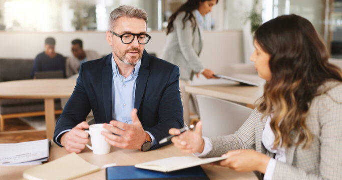 Collaboration, documents and meeting with business people in lobby of coworking office for update. Conversation, feedback and paperwork with employee team in corporate workplace for contract review