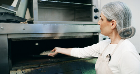 Bakery, pastry chef and woman in commercial kitchen with oven, quality control and small business. Baker, order and stock for catering, restaurant industry and production for breakfast or snack
