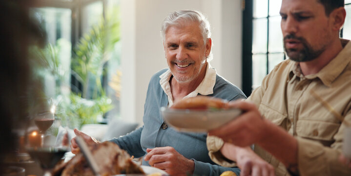 Serving, happy family and thanksgiving lunch in home for holiday season, eating and celebration. Festive feast, food and people with social gathering at dining table for tradition, bonding or hosting