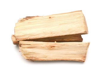 A stack of split firewood on a white background 
