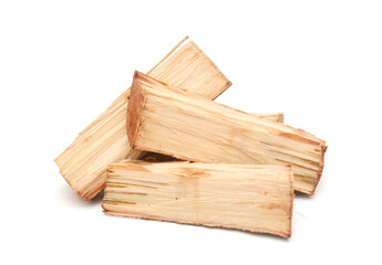 A stack of split firewood on a white background 