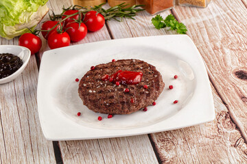 Grilled juicy beef cutlet for burger