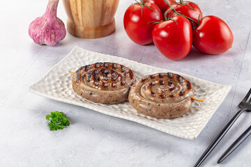 Grilled beef round circle sausages