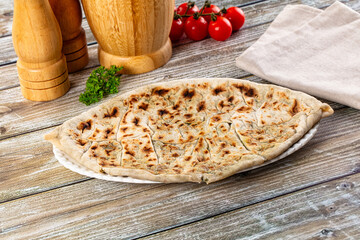 Turkish Kutab staffed green herbs