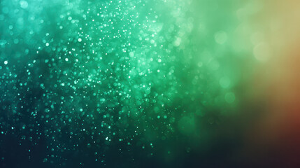 Magical abstract green background with dusty glitter and sparkle bokeh