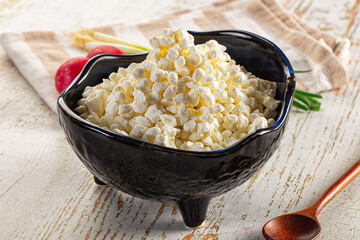 Grain cottage cheese in the bowl