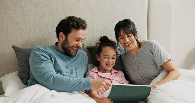 Parents, girl and tablet in bed, laugh and bonding for online streaming, film and subscription in home. People, mom and dad with child, tech or pyjamas with app for cartoon movie at family house