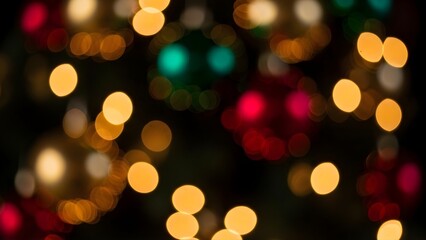 Obraz premium Warm and vibrant bokeh lights creating a magical, dreamy atmosphere, perfect for festive backgrounds and holiday celebrations