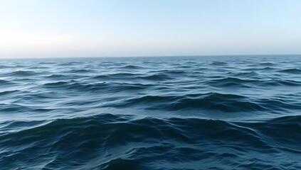 Calm Blue Ocean Waves Reflecting the Sky in Serene Maritime Scene