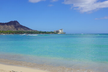 Sunny Waikiki beach with Diamond Head panorama