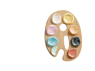 Wooden palette with dabs of pastel-colored paint swirls