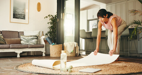 Fitness, getting ready and yoga mat with woman in living room of home for holistic health. Exercise, start and wellness with mature yogi person in apartment for balance, awareness or mindfulness