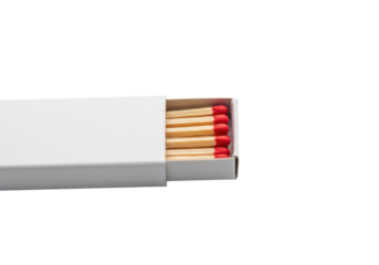 A transparent matchbox, partially open, revealing red-tipped wooden matches in a photorealistic still life on a transparent background with soft studio light. Concept of unignited potential