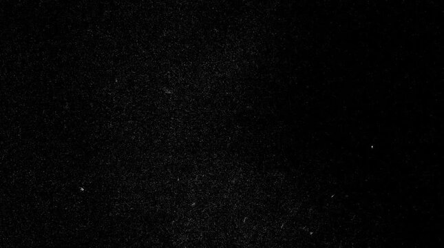 Atmospheric Dust Particles Floating on Black Background