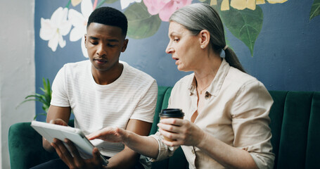 Cafe, meeting and people with tablet, planning and conversation with web design. Teamwork, man and woman in coffee shop, brainstorming and ideas for project, feedback and review for proposal