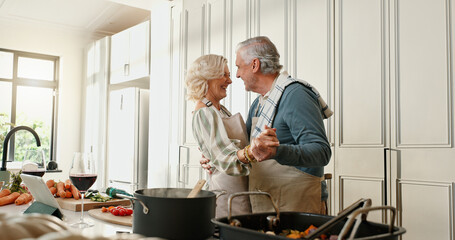 Senior, happy couple and dancing with food in kitchen for fun cooking, meal prep or vibe in home....