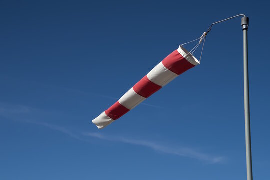 windsock on blue sky background