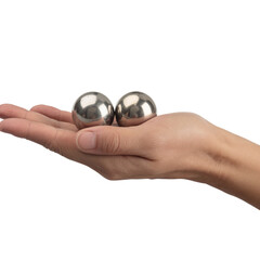 Hand holding two metal baoding balls isolated on transparent background
