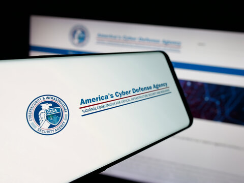 Stuttgart, Germany - 11-02-2025: Smartphone with logo of cyber security and infrastructure agency CISA on screen in front of website. Focus on center-left of phone display.