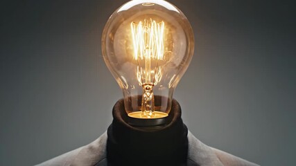 Man with lightbulb head, a surreal concept of innovation. Creative business idea generation and intellectual illumination theme.