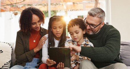 Tablet, relax and parents with children on sofa in home for watching movie, series or show. Flare,...