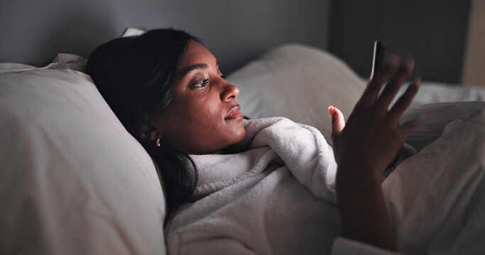 Streaming, night or woman in bed with phone, online reading or video browse on social media. Relax, ebook and girl in house with tech, entertainment subscription or digital app scroll in late evening - Powered by Adobe