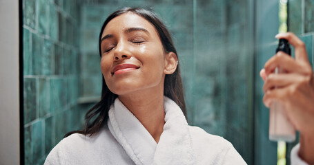 Woman, skincare and spray with face mist in bathroom for hydration, dermatology or beauty cosmetic....