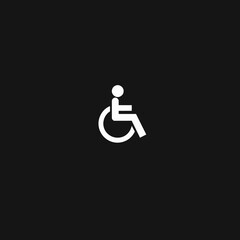 A white wheelchair symbol with a person seated, centered on a black background.
