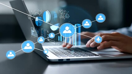 Hands typing on a laptop with holographic data, charts, and user icons displayed - Powered by Adobe