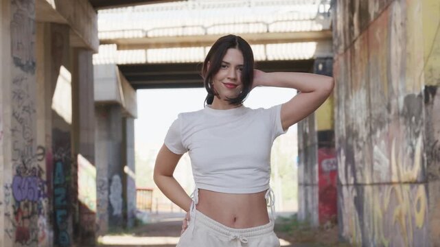 Female street dancer performing a kpop choreography, slow motion, 120fps