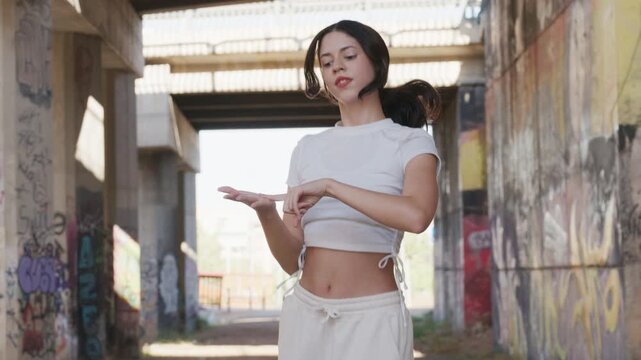 Young woman performing a kpop dance choreography in slow motion, slow motion, 120fps