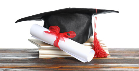 Diploma, notebooks and graduation hat on wooden table against white background