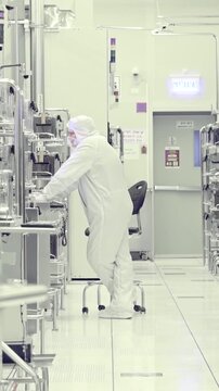 Vertical footage of workers in a Semiconductor manufacturing facility
