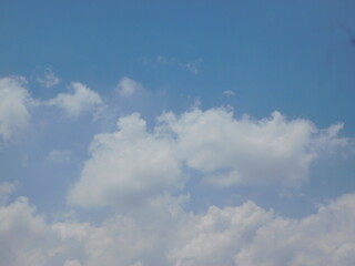Beautiful White Puffy Clouds and Summer Sky