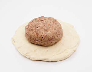 Raw Yeast Dough with Bean Paste Filling on a White Background