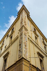 16th century corner building in Palermo, Italy. Originally housing courts on upper floors & prison ground floor, repurposed as finance office 19th century, now abandoned. Neoclassical relief carvings