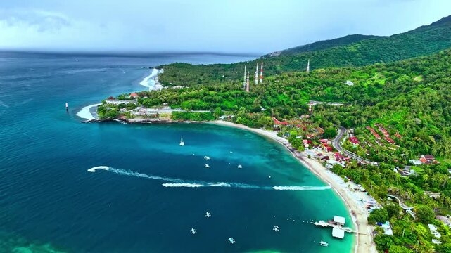 aerial view of the bay at lombok senggigi beach as storm clouds approach in the sky