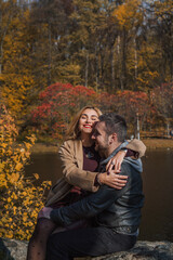 Elegant European couple walking together through picturesque city streets. Warm autumn light, gentle smiles, and cinematic vintage atmosphere 