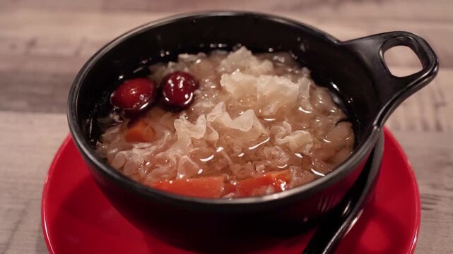 Traditional Chinese sweet soup made with white fungus, red dates, papaya and goji berries. 