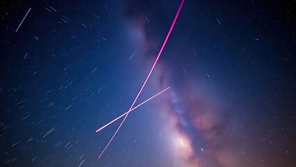  Double-exposure night sky with intersecting vibrant meteor trails, representing celestial events.