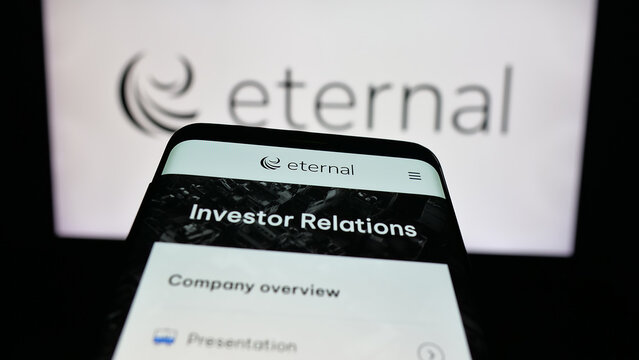 Stuttgart, Germany - 11-02-2025: Mobile phone with website of Indian technology company Eternal Limited on screen in front of logo. Focus on top-left of phone display.