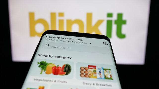 Stuttgart, Germany - 11-02-2025: Mobile phone with website of Indian company Blinkit (Blink Commerce) on screen in front of logo. Focus on top-left of phone display.