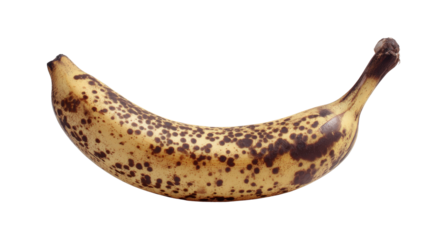 A banana with a few brown spots placed against a the imperfections adding character and texture to the otherwise smooth fruit isolated on a Transparent background, PNG file.