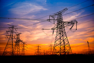 Fototapeta premium Pylon, high-voltage tower sky background.