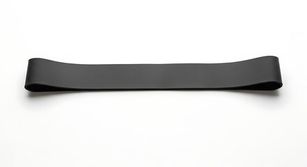 A close up shot of a black resistance band lying flat on a white surface in a studio setting ai generated