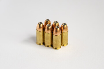 Group of Hollow Point Cartridges Standing on White Background