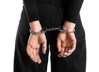Woman in metal handcuffs on white background, closeup